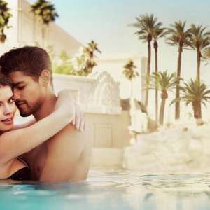 mandalay-bay-amenities-pool-mandalay-bay-beach-couple-in-water.tif.image.300.300.high